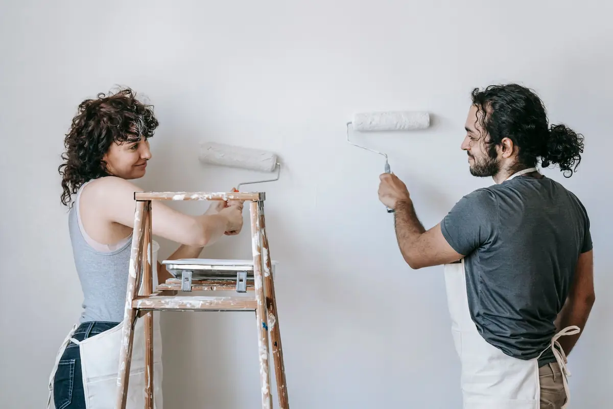 People painting a wall together — painting help in Santa Rosa